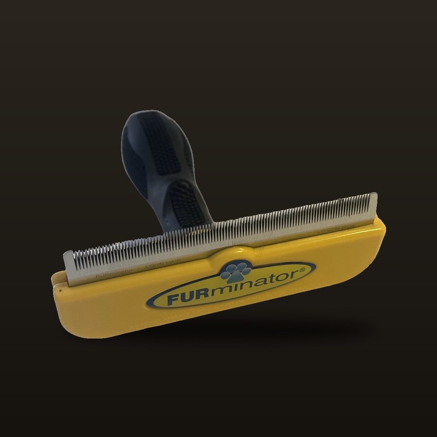 Yellow FURminator long hair deshedding tool