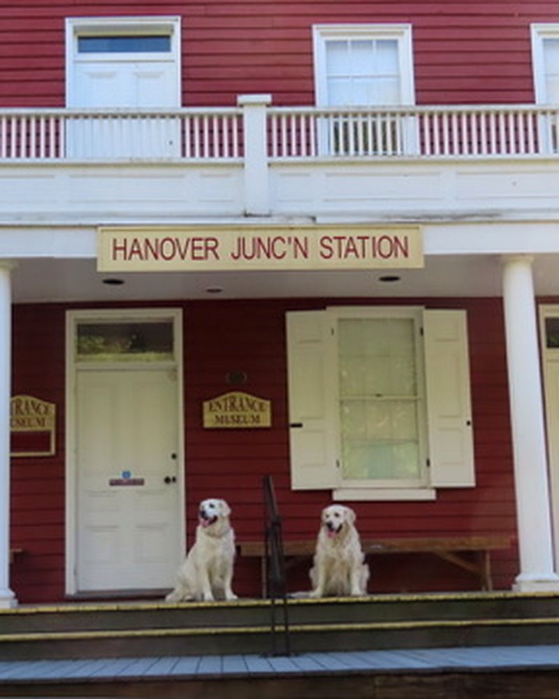 Sawyer and Theo on the steps of Hanover Junction station
