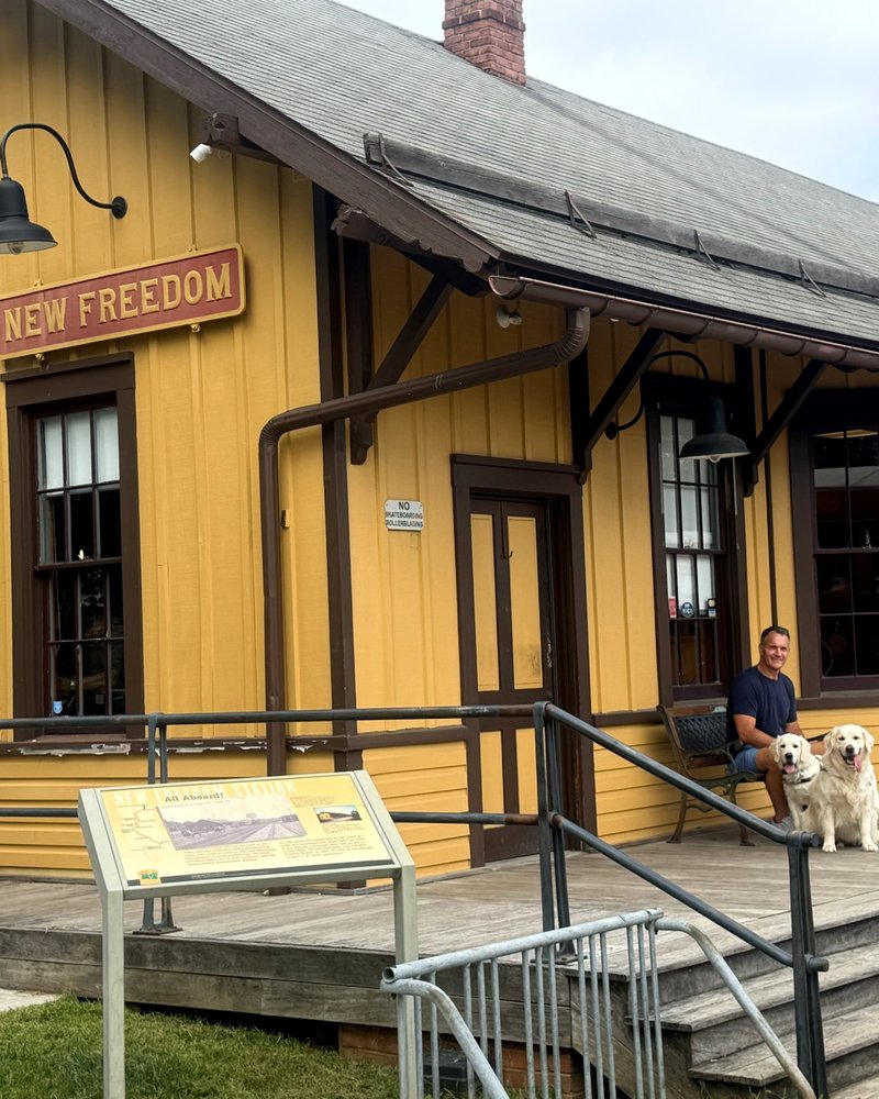 Trey, Theo and Beau on the bench at the New Freedom train station
